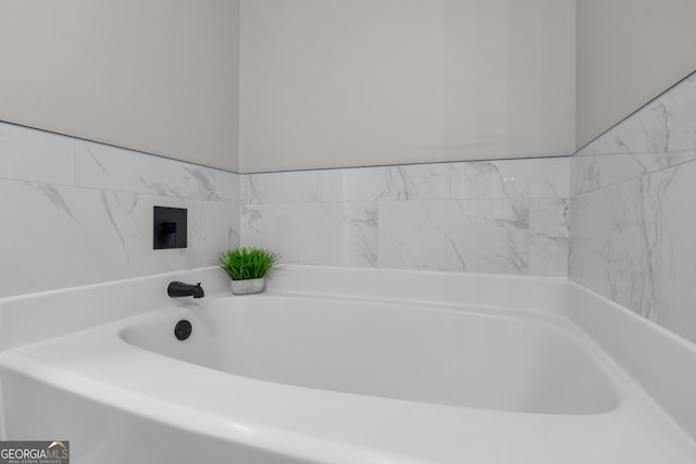 bathroom featuring a bath