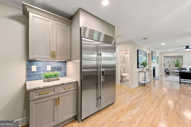 1186 Thomas Rd, Decatur, GA 30030 - kitchen featuring built in fridge, gray cabinetry, baseboards, tasteful backsplash, and recessed lighting