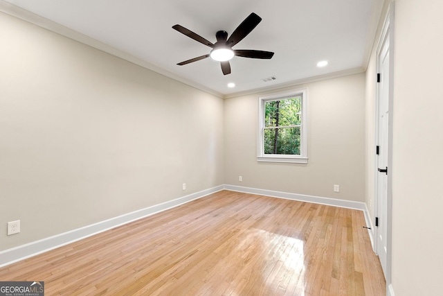 1186 Thomas Rd, Decatur, GA 30030 - empty room featuring baseboards, crown molding, light wood-type flooring, a ceiling fan, and recessed lighting