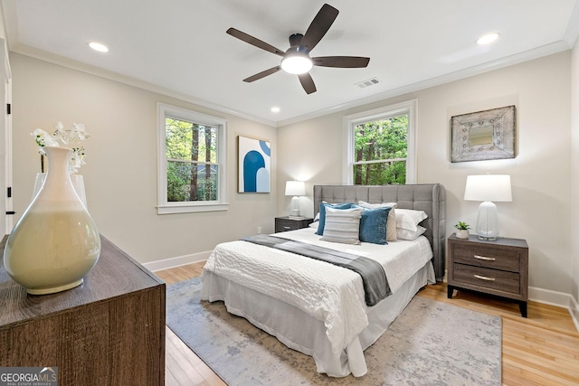 1186 Thomas Rd, Decatur, GA 30030 - bedroom with multiple windows, ornamental molding, baseboards, light wood-type flooring, and recessed lighting