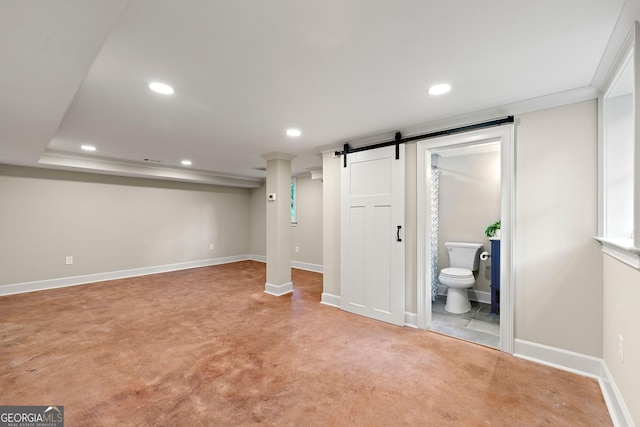 1186 Thomas Rd, Decatur, GA 30030 - finished below grade area featuring a barn door, recessed lighting, baseboards, and light carpet