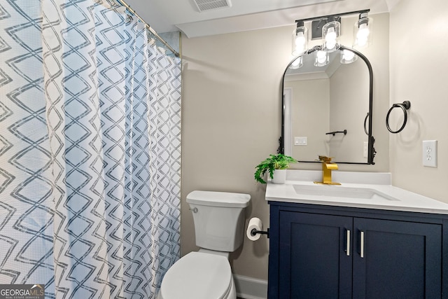 1186 Thomas Rd, Decatur, GA 30030 - bathroom with toilet, vanity, and a shower with shower curtain