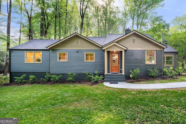 1186 Thomas Rd, Decatur, GA 30030 - ranch-style home with a front yard, a chimney, and roof with shingles