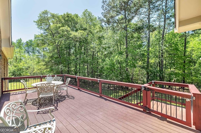 330 Noah Pl, Mcdonough, GA 30252 - wooden deck with outdoor dining area