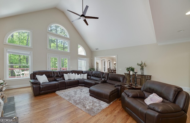 330 Noah Pl, Mcdonough, GA 30252 - living room with high vaulted ceiling, a ceiling fan, and light wood finished floors