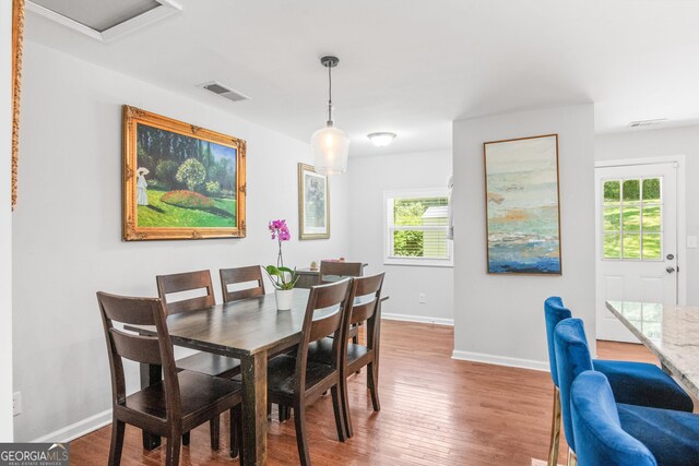 1954 Timothy Dr NE, Atlanta, GA 30329 - dining room featuring baseboards and wood finished floors