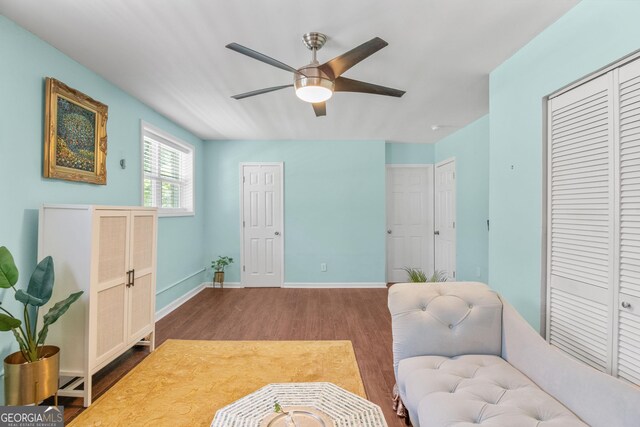 1954 Timothy Dr NE, Atlanta, GA 30329 - sitting room with wood finished floors, a ceiling fan, and baseboards