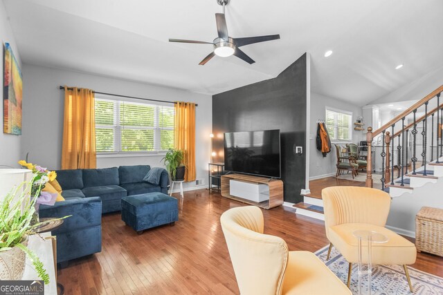 1954 Timothy Dr NE, Atlanta, GA 30329 - living room with a ceiling fan, stairs, wood-type flooring, vaulted ceiling, and baseboards