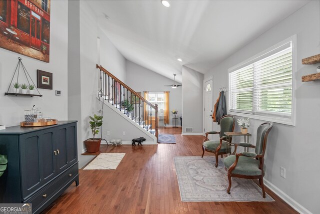 1954 Timothy Dr NE, Atlanta, GA 30329 - sitting room featuring stairs, vaulted ceiling, wood finished floors, baseboards, and recessed lighting