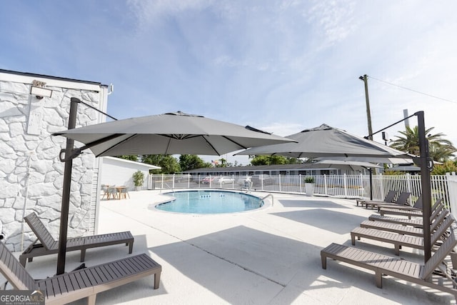 450 Warren Mason Blvd, Brunswick, GA 31520 - pool featuring fence and a patio