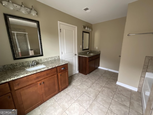 2 Hillshire Dr, Newnan, GA 30263 - full bathroom featuring a sink, a shower stall, visible vents, and tile patterned floors