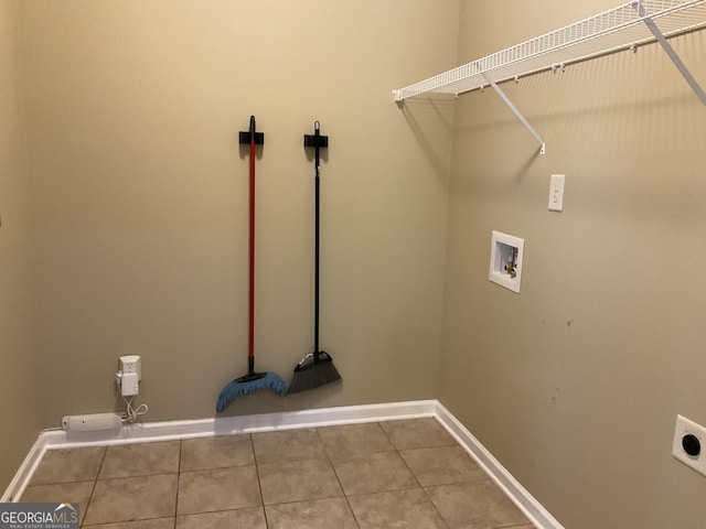 2 Hillshire Dr, Newnan, GA 30263 - laundry area featuring laundry area, tile patterned flooring, electric dryer hookup, baseboards, and hookup for a washing machine