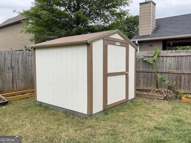 2 Hillshire Dr, Newnan, GA 30263 - view of shed with a fenced backyard