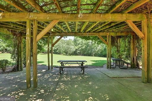 2 Hillshire Dr, Newnan, GA 30263 - view of community with a yard and a patio area