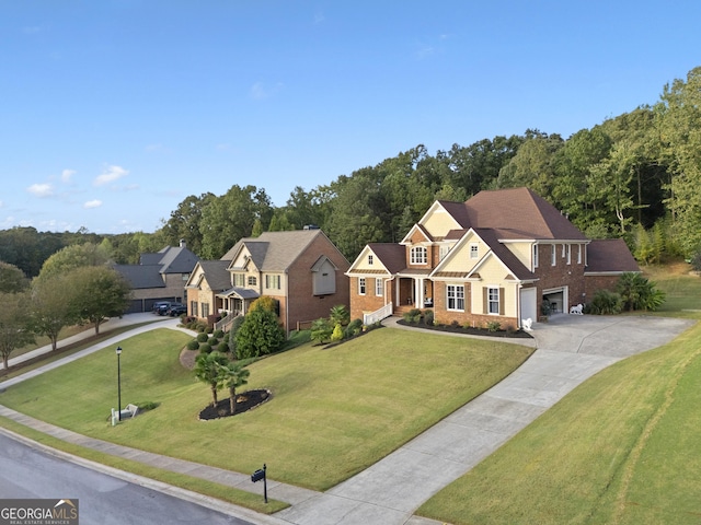view of front facade featuring a garage, brick siding, a front lawn, and concrete driveway