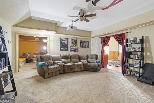 living area featuring ceiling fan, carpet flooring, and visible vents