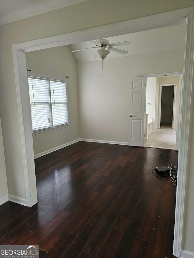 5114 Verbena Dr NW, Acworth, GA 30102 - empty room with vaulted ceiling, hardwood / wood-style floors, baseboards, and ceiling fan