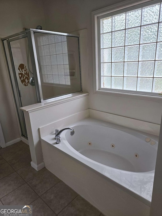 5114 Verbena Dr NW, Acworth, GA 30102 - full bathroom featuring a shower stall, a tub with jets, and tile patterned flooring