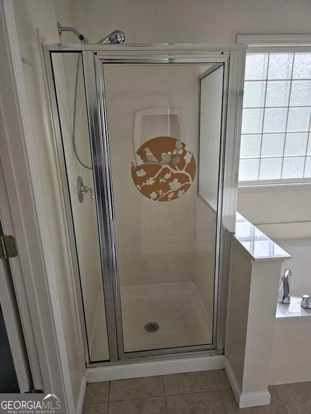 5114 Verbena Dr NW, Acworth, GA 30102 - full bath featuring plenty of natural light, tile patterned flooring, and a shower stall