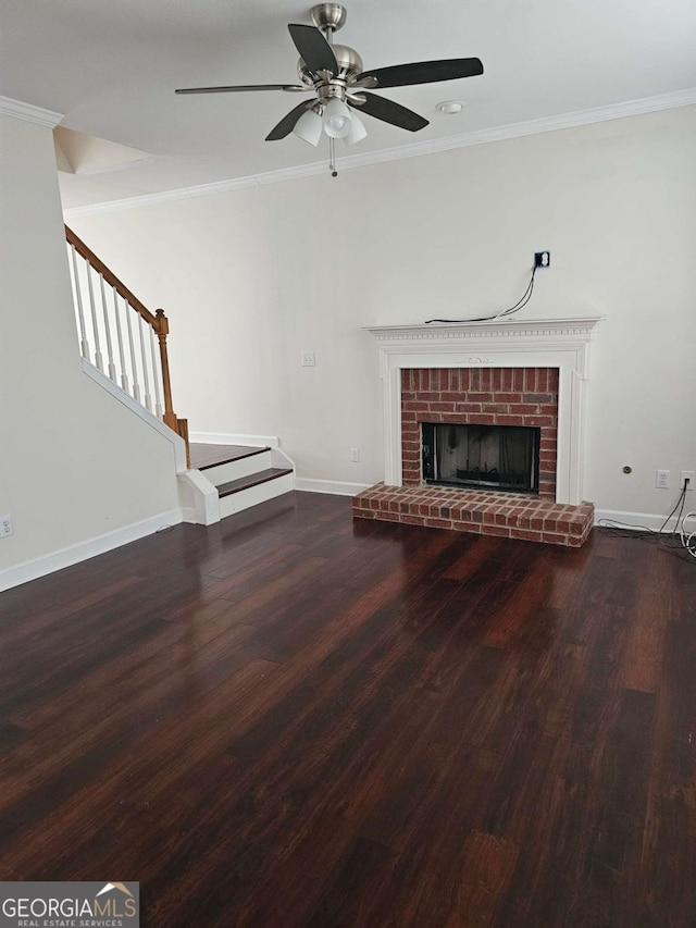 5114 Verbena Dr NW, Acworth, GA 30102 - unfurnished living room featuring baseboards, wood finished floors, stairs, ceiling fan, and a fireplace