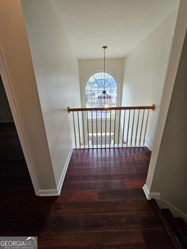 5114 Verbena Dr NW, Acworth, GA 30102 - staircase with a chandelier, baseboards, and hardwood / wood-style flooring