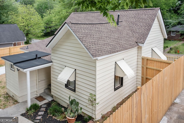 26 Walker St, Cartersville, GA 30120 - exterior space with roof with shingles and fence