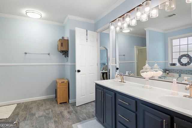 57 Glenn Eagles Way, Hiram, GA 30141 - full bathroom with a stall shower, wood finished floors, ornamental molding, double vanity, and a garden tub
