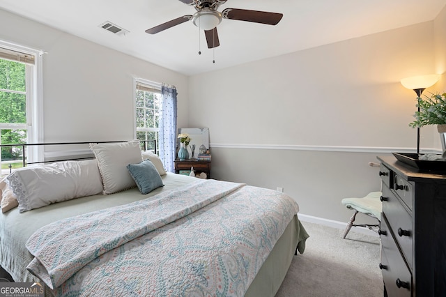57 Glenn Eagles Way, Hiram, GA 30141 - carpeted bedroom with baseboards and a ceiling fan