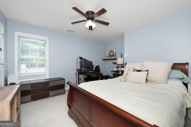 57 Glenn Eagles Way, Hiram, GA 30141 - bedroom with light colored carpet and ceiling fan