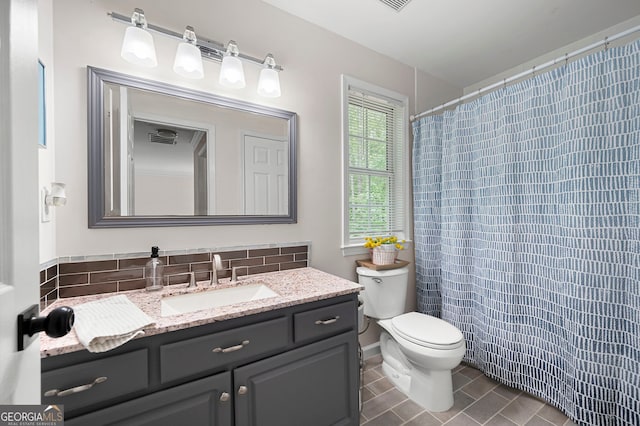 57 Glenn Eagles Way, Hiram, GA 30141 - bathroom featuring vanity, toilet, tile patterned floors, and a shower with curtain