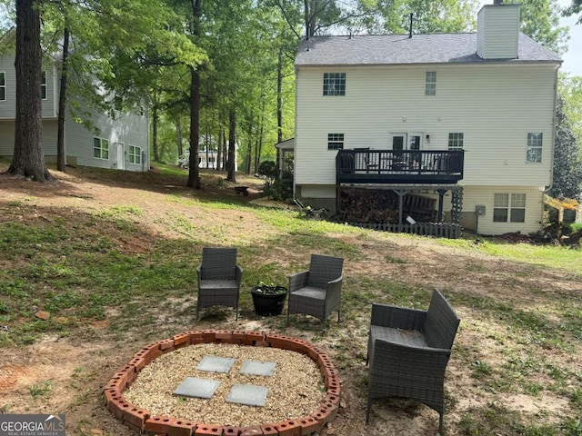 view of yard with a wooden deck