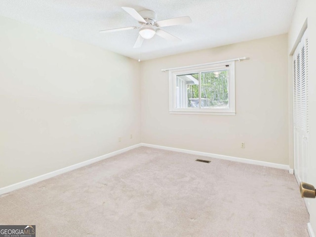 1961 Mars Hill Rd, Watkinsville, GA 30677 - unfurnished bedroom with a closet, carpet floors, visible vents, and baseboards
