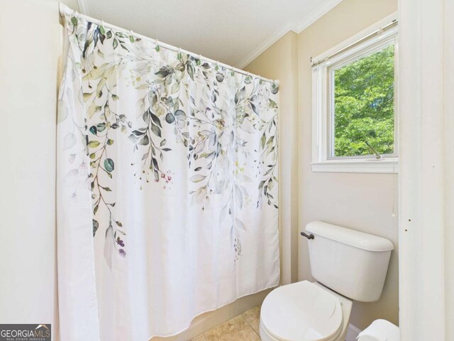 1961 Mars Hill Rd, Watkinsville, GA 30677 - bathroom featuring tile patterned flooring, toilet, ornamental molding, and a shower with curtain