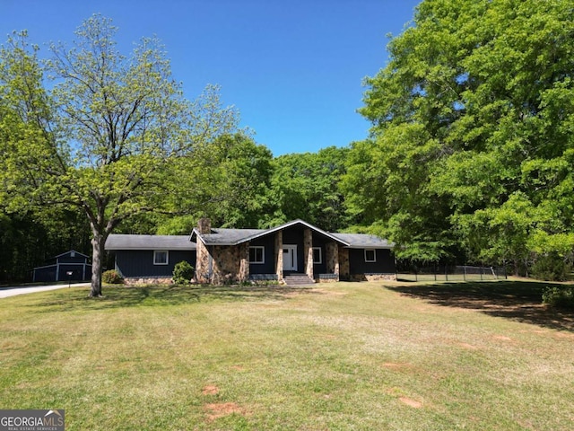 1961 Mars Hill Rd, Watkinsville, GA 30677 - view of front of property with a chimney, a front lawn, and fence