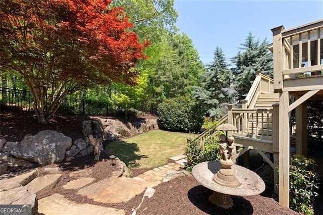 4675 Lakeway Pl, Alpharetta, GA 30005 - view of yard with a wooden deck, stairs, and fence