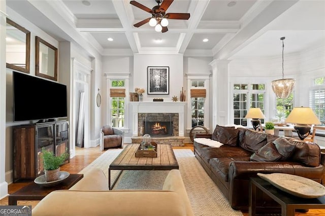 4675 Lakeway Pl, Alpharetta, GA 30005 - living room featuring coffered ceiling, wood finished floors, beam ceiling, a fireplace, and ceiling fan with notable chandelier