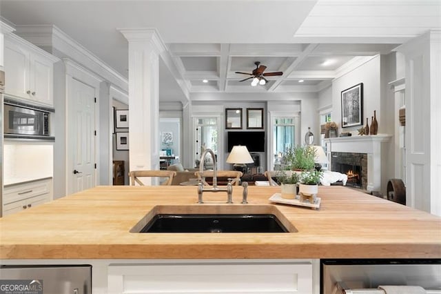 4675 Lakeway Pl, Alpharetta, GA 30005 - kitchen featuring butcher block counters, open floor plan, and a sink