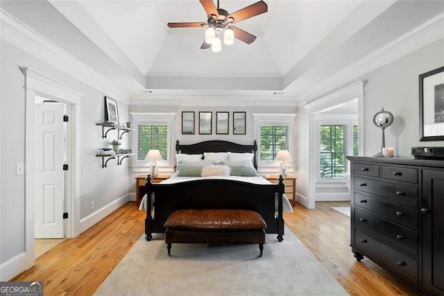 4675 Lakeway Pl, Alpharetta, GA 30005 - bedroom with light wood-style flooring, baseboards, vaulted ceiling, and multiple windows