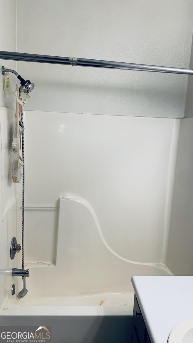 full bathroom featuring vanity and shower / tub combination