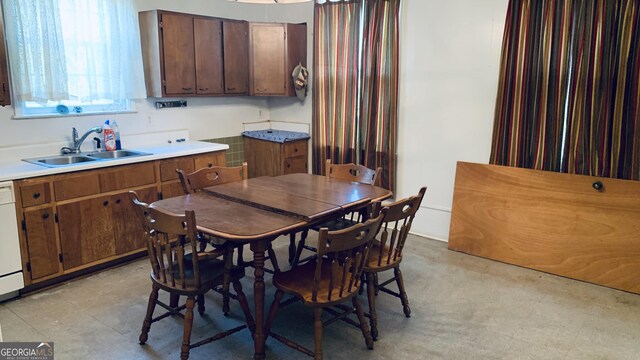 dining space featuring light floors