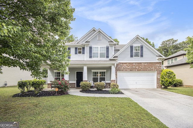 4440 Spring Mtn Ln, Powder Springs, GA 30127 - craftsman-style house with a porch, a front lawn, a garage, brick siding, and concrete driveway