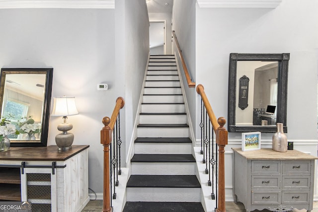 4440 Spring Mtn Ln, Powder Springs, GA 30127 - staircase with crown molding and baseboards