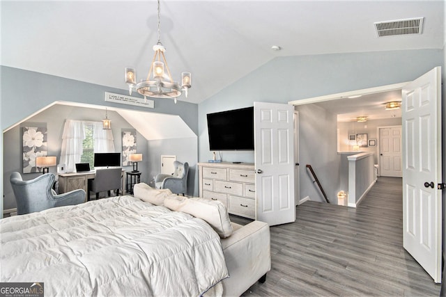 4440 Spring Mtn Ln, Powder Springs, GA 30127 - bedroom with lofted ceiling, wood finished floors, and a chandelier