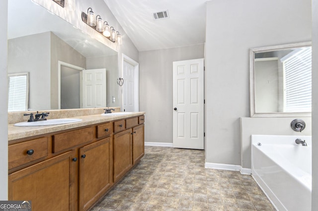4440 Spring Mtn Ln, Powder Springs, GA 30127 - full bathroom with double vanity and a bath