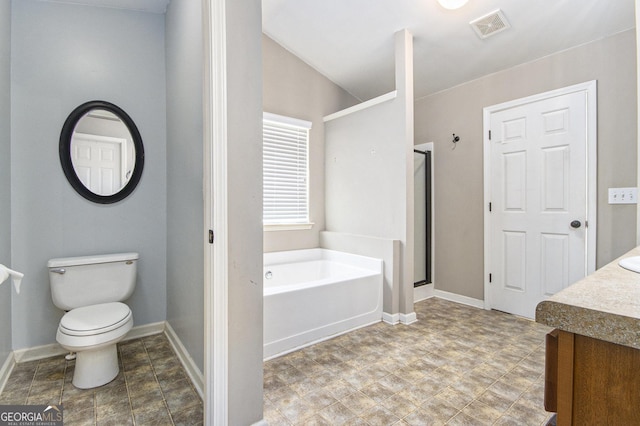 4440 Spring Mtn Ln, Powder Springs, GA 30127 - full bathroom featuring a garden tub, vanity, a shower stall, and vaulted ceiling