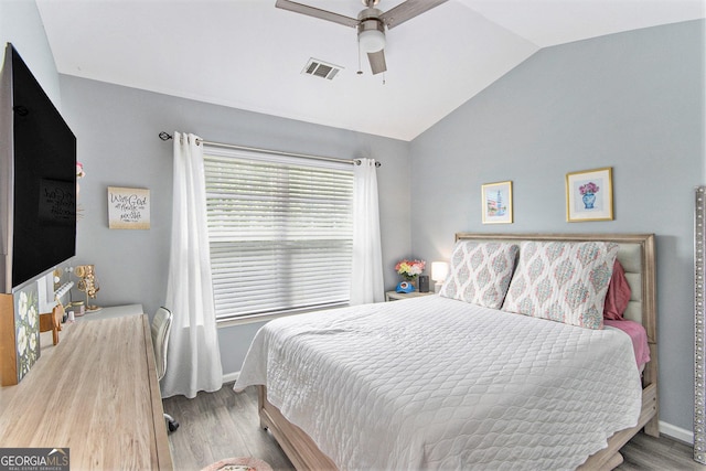 4440 Spring Mtn Ln, Powder Springs, GA 30127 - bedroom with lofted ceiling, wood finished floors, and a ceiling fan
