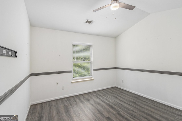 4440 Spring Mtn Ln, Powder Springs, GA 30127 - spare room featuring ceiling fan, visible vents, vaulted ceiling, baseboards, and wood finished floors