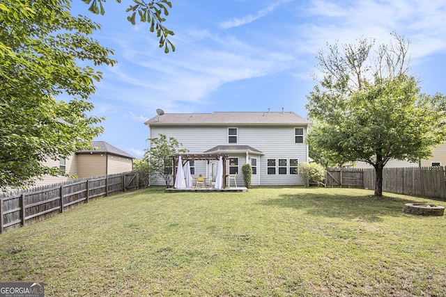4440 Spring Mtn Ln, Powder Springs, GA 30127 - rear view of house featuring a patio, an outdoor fire pit, a fenced backyard, and a lawn