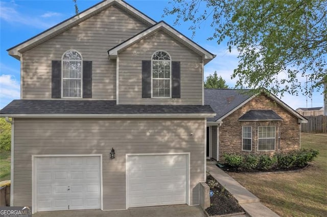 831 Kendall Park Dr, Winder, GA 30680 - view of front of home with an attached garage and driveway