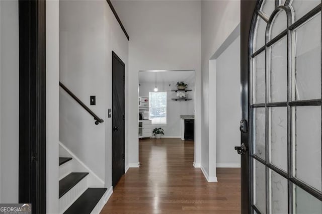 831 Kendall Park Dr, Winder, GA 30680 - entrance foyer with wood finished floors, stairs, and baseboards